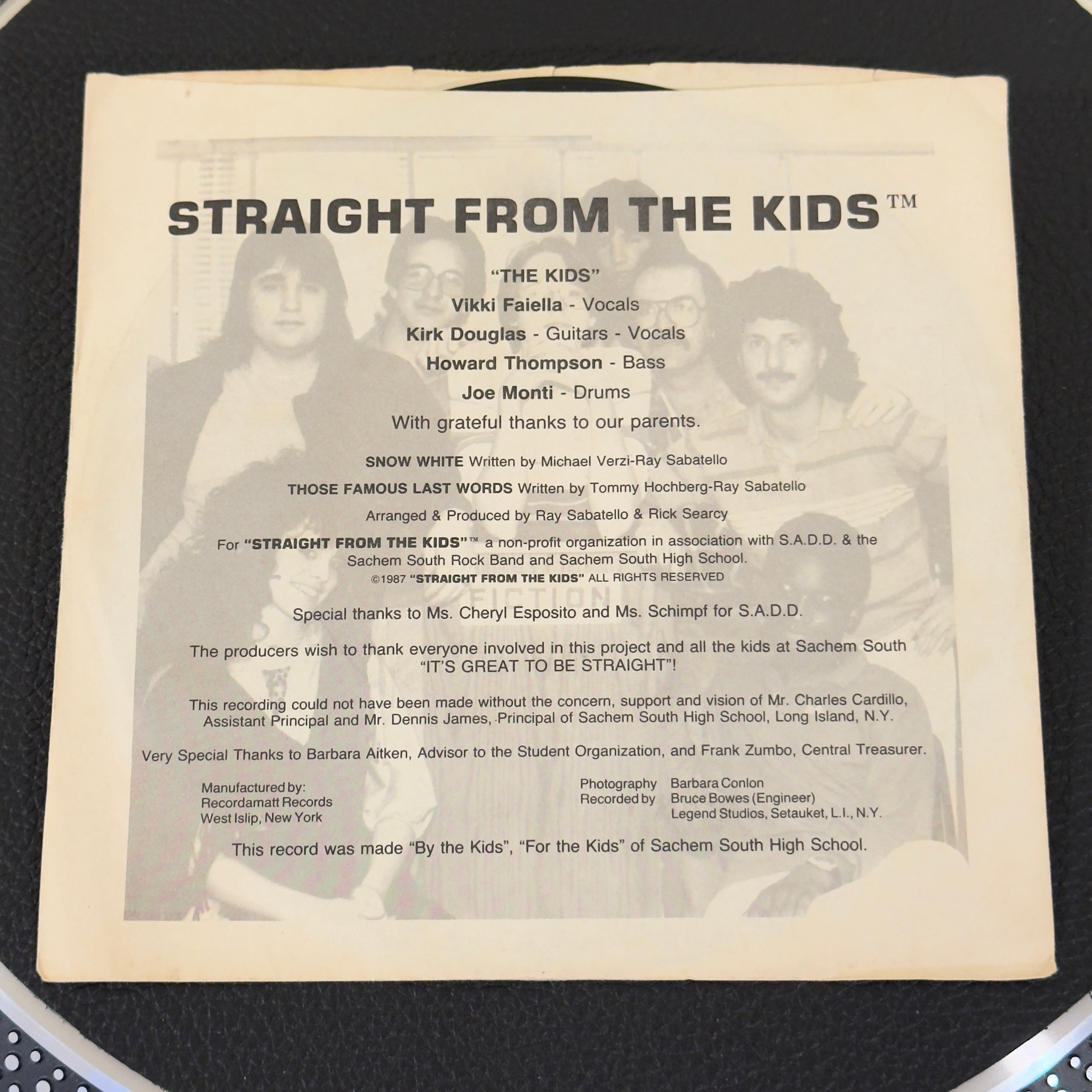 7" vinyl record by Straight From The Kids featuring "Snow White/Those Famous Last Words", released on Straight Kids (REC-0770), in VG+ (Very Good Plus) condition, classic analog collectable for turntable playback. Super Rare Pre - Roots "Captain" Kirk Douglas High school band! Pic Sleeve Included!