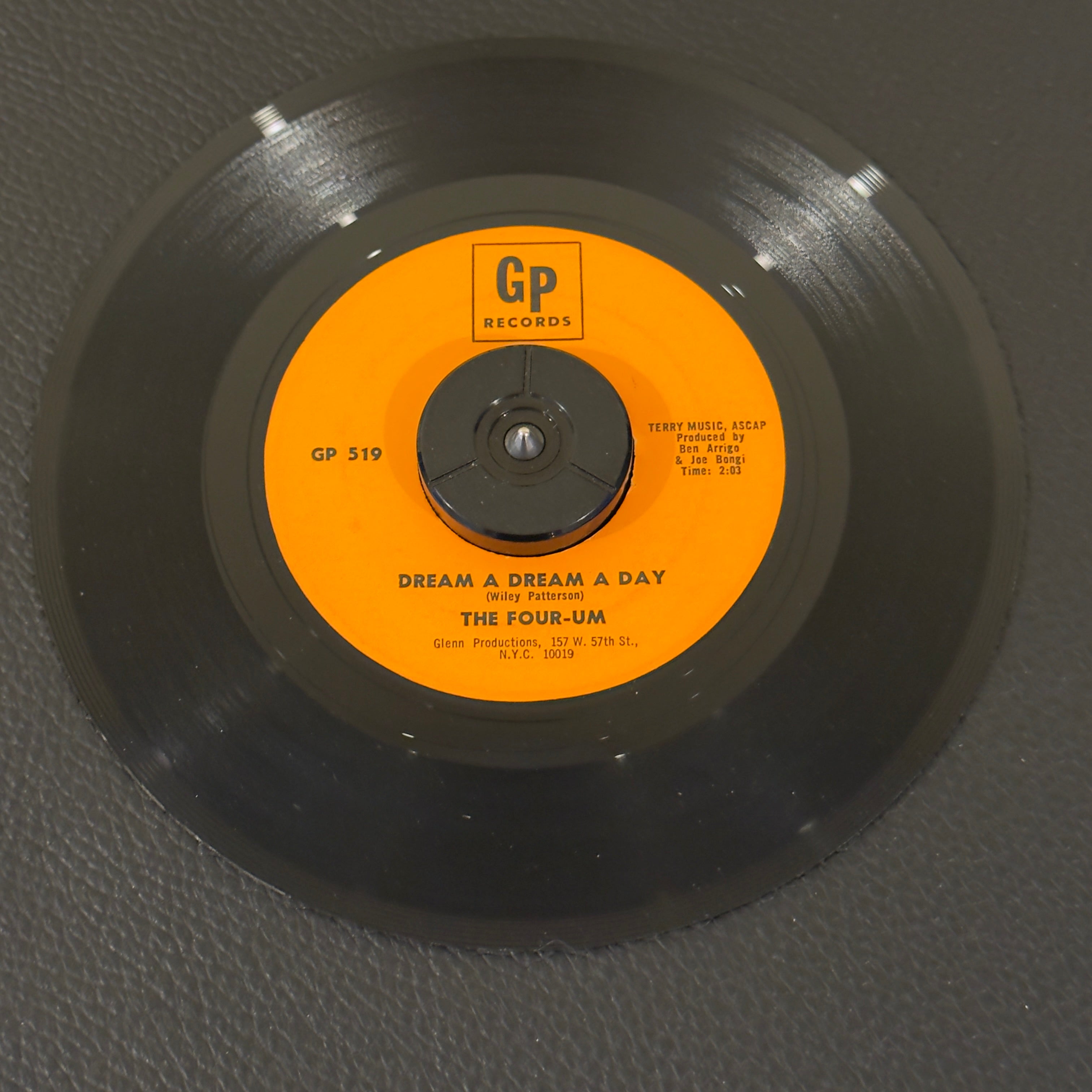 7" vinyl record by Four-Um, The featuring "Let's Make It One Day/Dream A Dream A Day", released on GP Records (GP-519), in VG (Very Good) condition, classic analog collectable for turntable playback. Rare!!!  Plays great!