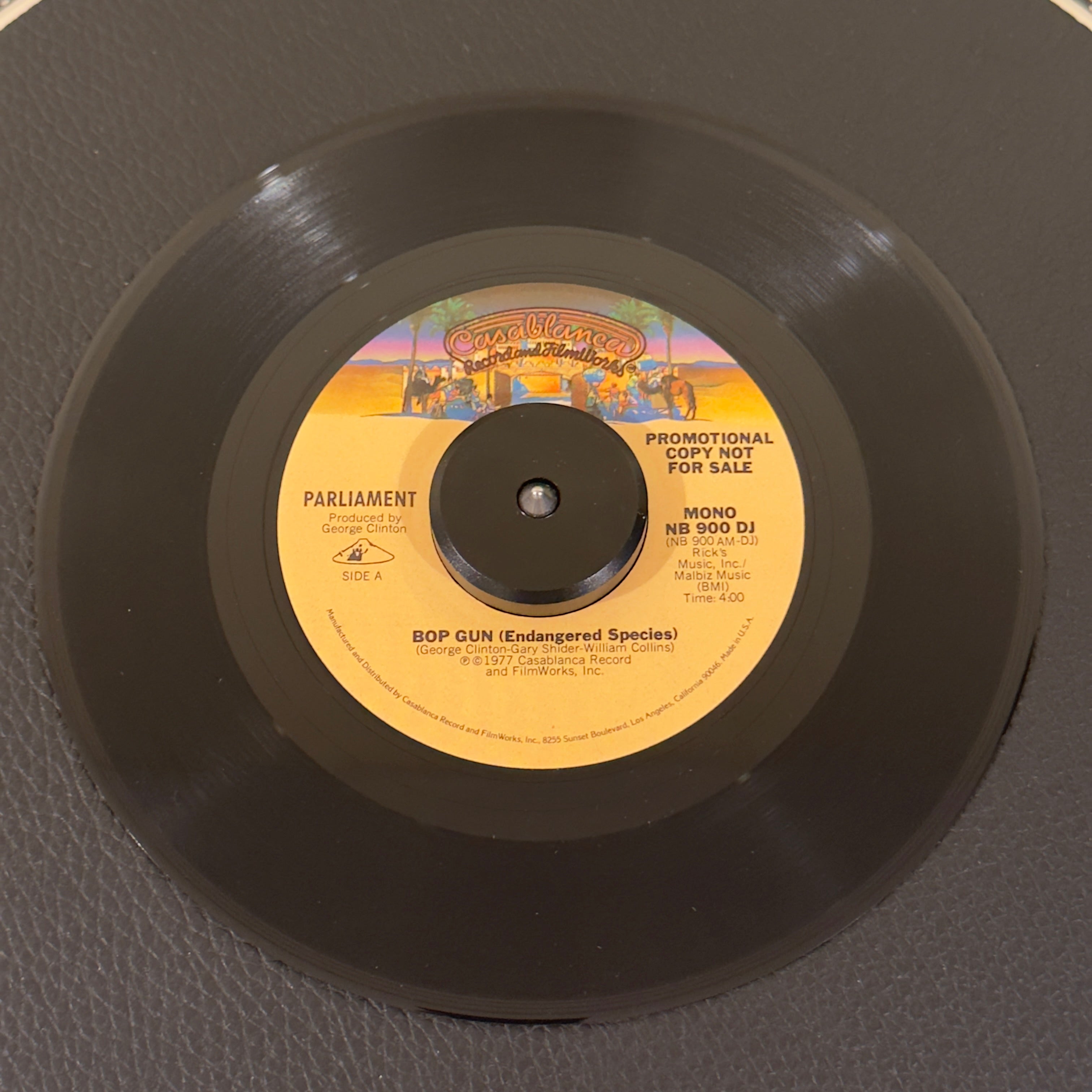 7" vinyl record by Parliament featuring "Bop Gun (Endangered Species) Mono", released on Casablanca (NB900DJ), in NM (Near Mint) condition, classic analog collectable for turntable playback. Original 1977 US radio station promotional pressing of the definitive P-Funk classic in the original Casablanca sleeve.