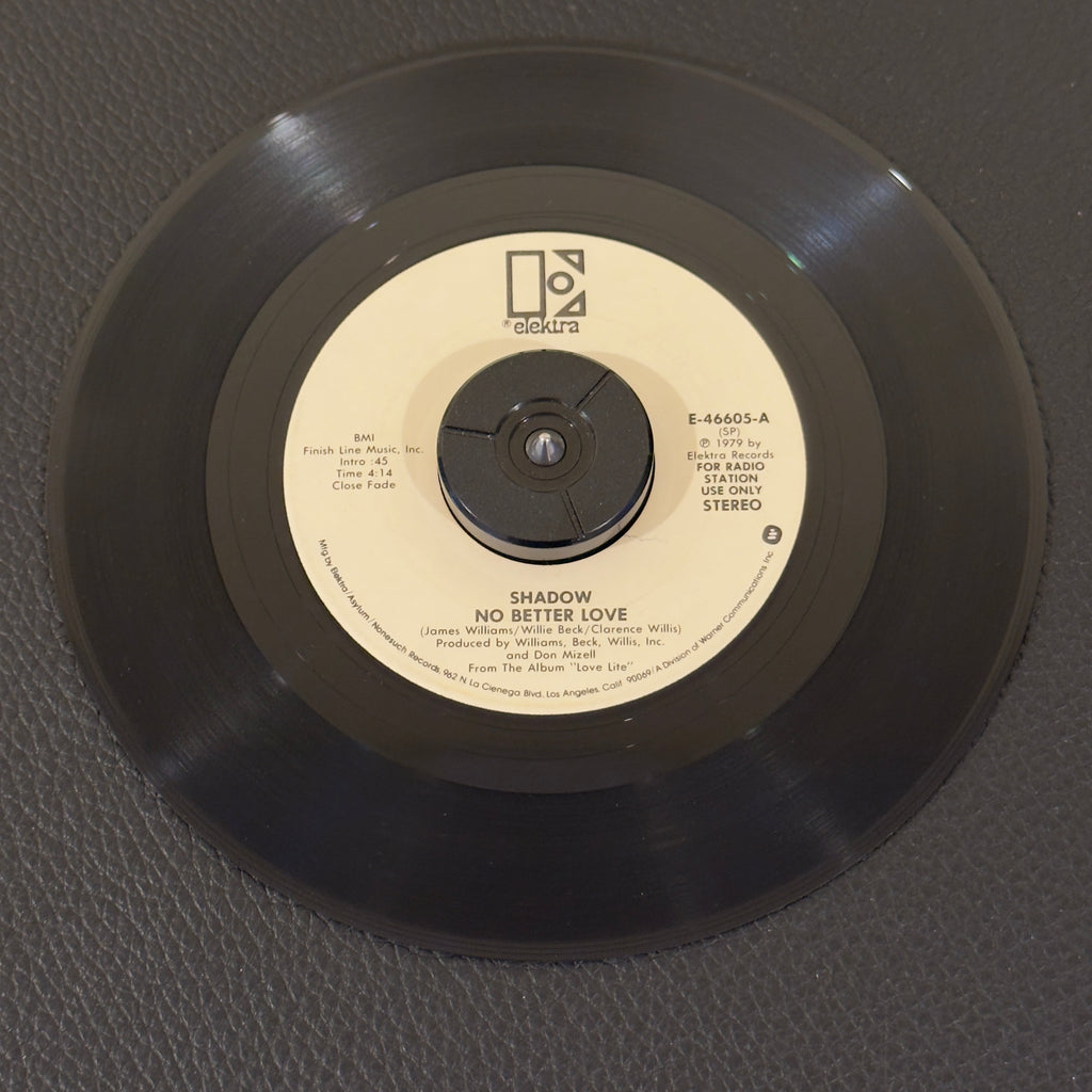 7" vinyl record by Shadow featuring "No Better Love/No Better Love", released on Elektra (E-46605), in VG+ (Very Good Plus) condition, classic analog collectable for turntable playback. Promo Copy! Original Elektra sleeve included.  Writing on label (Side A).