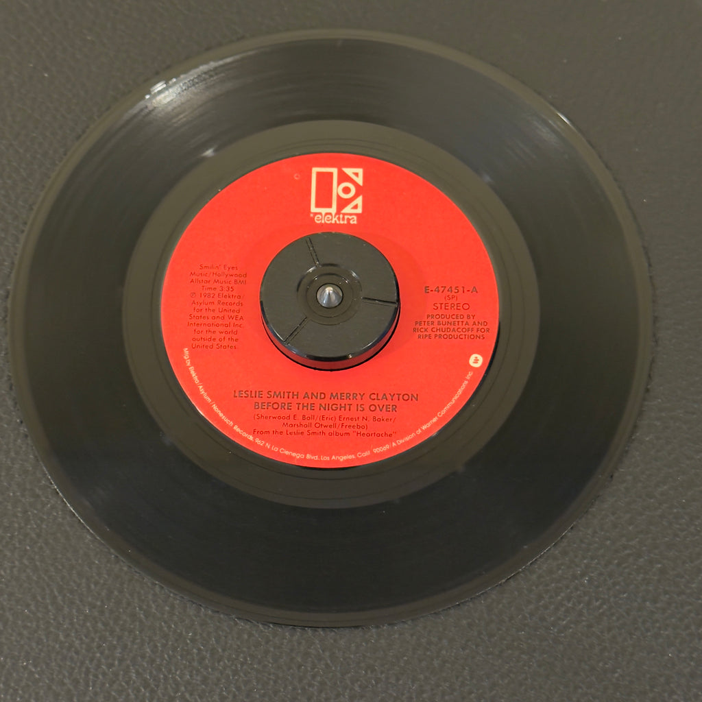 7" vinyl record by Leslie Smith featuring "Before The Night Is Over/Don't Shut The Door (On My Love)", released on Elektra (E-47451), in VG+ (Very Good Plus) condition, classic analog collectable for turntable playback. Includes original Elektra sleeve.