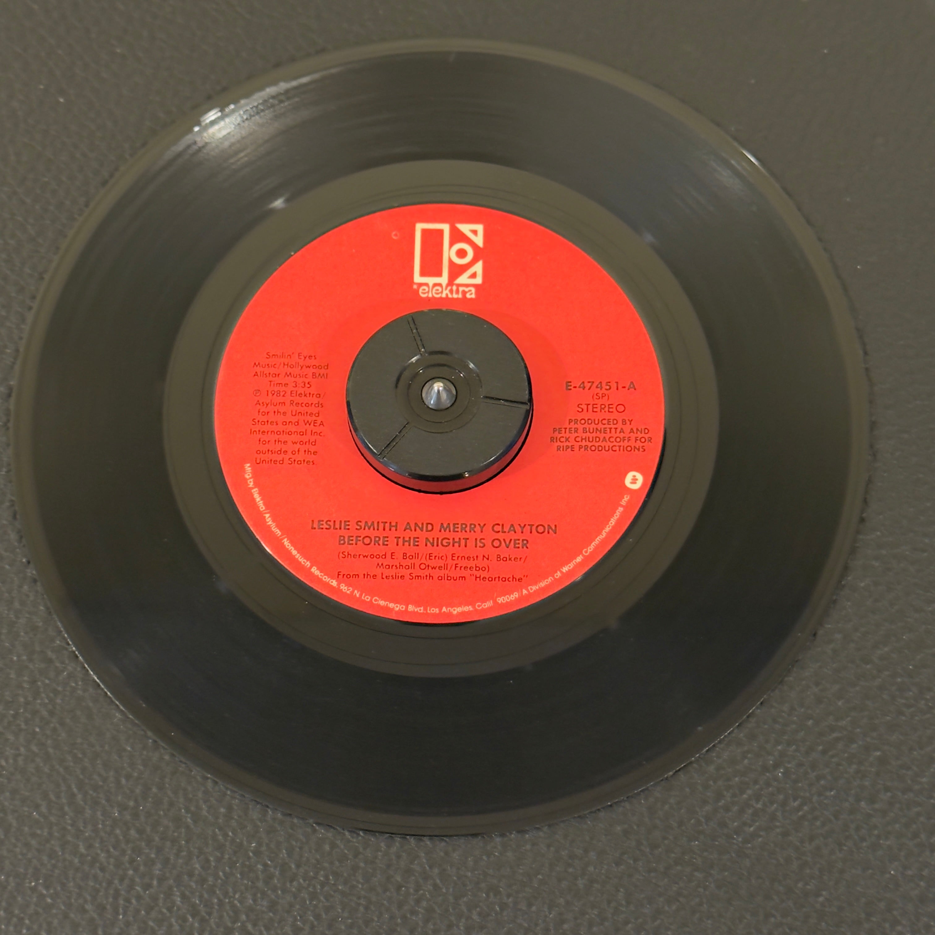 7" vinyl record by Leslie Smith featuring "Before The Night Is Over/Don't Shut The Door (On My Love)", released on Elektra (E-47451), in VG+ (Very Good Plus) condition, classic analog collectable for turntable playback. Includes original Elektra sleeve.