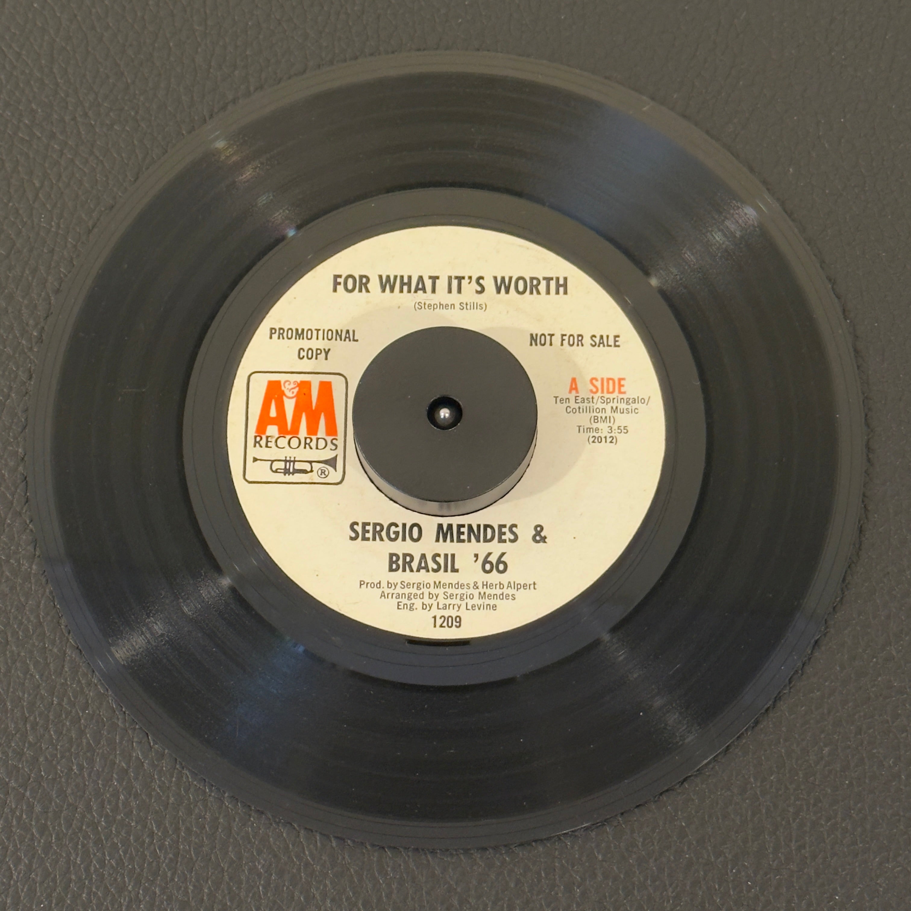 7" vinyl record by Sergio Mendes & Brasil '66 featuring "For What It's Worth/Viramundo", released on A&M Records (1209), in VG (Very Good) condition, classic analog collectable for turntable playback. Rare Promo Copy!  Original A&M sleeve included.