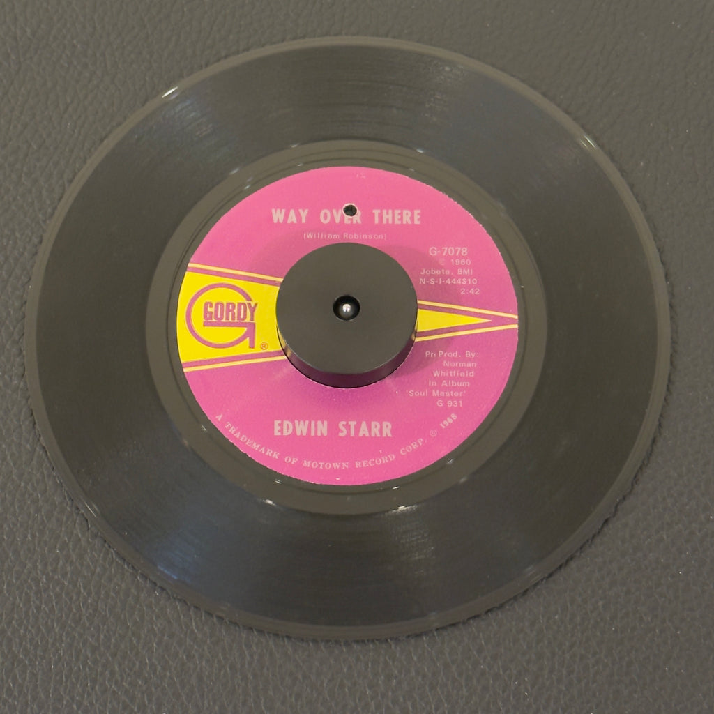 7" vinyl record by Edwin Starr featuring "Way Over There/If My Heart Could Tell The Story", released on Gordy (G-7078), in VG+ (Very Good Plus) condition, classic analog collectable for turntable playback. ARP Pressing.  Punch hole in label.