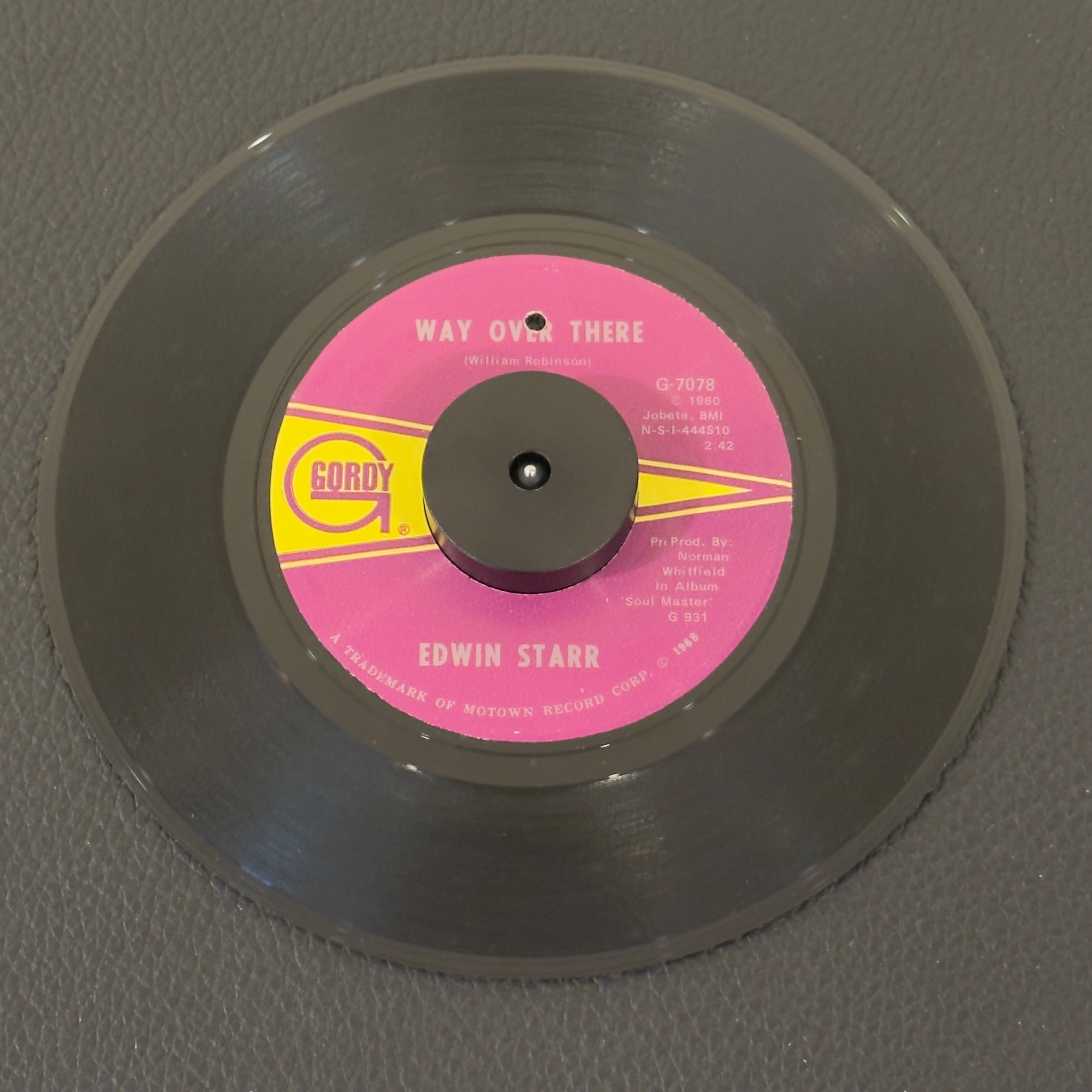 7" vinyl record by Edwin Starr featuring "Way Over There/If My Heart Could Tell The Story", released on Gordy (G-7078), in VG+ (Very Good Plus) condition, classic analog collectable for turntable playback. ARP Pressing.  Punch hole in label.