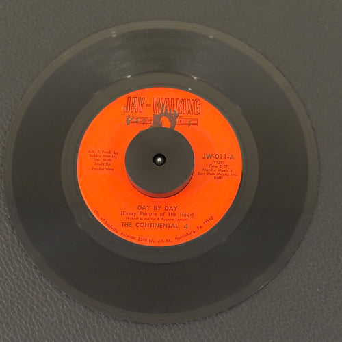 7" vinyl record by Continental 4, The featuring "Day By Day (Every Minute Of The Hour)/What Gave You Up", released on Jay-Walking (JW-011), in VG+ (Very Good Plus) condition, classic analog collectable for turntable playback.