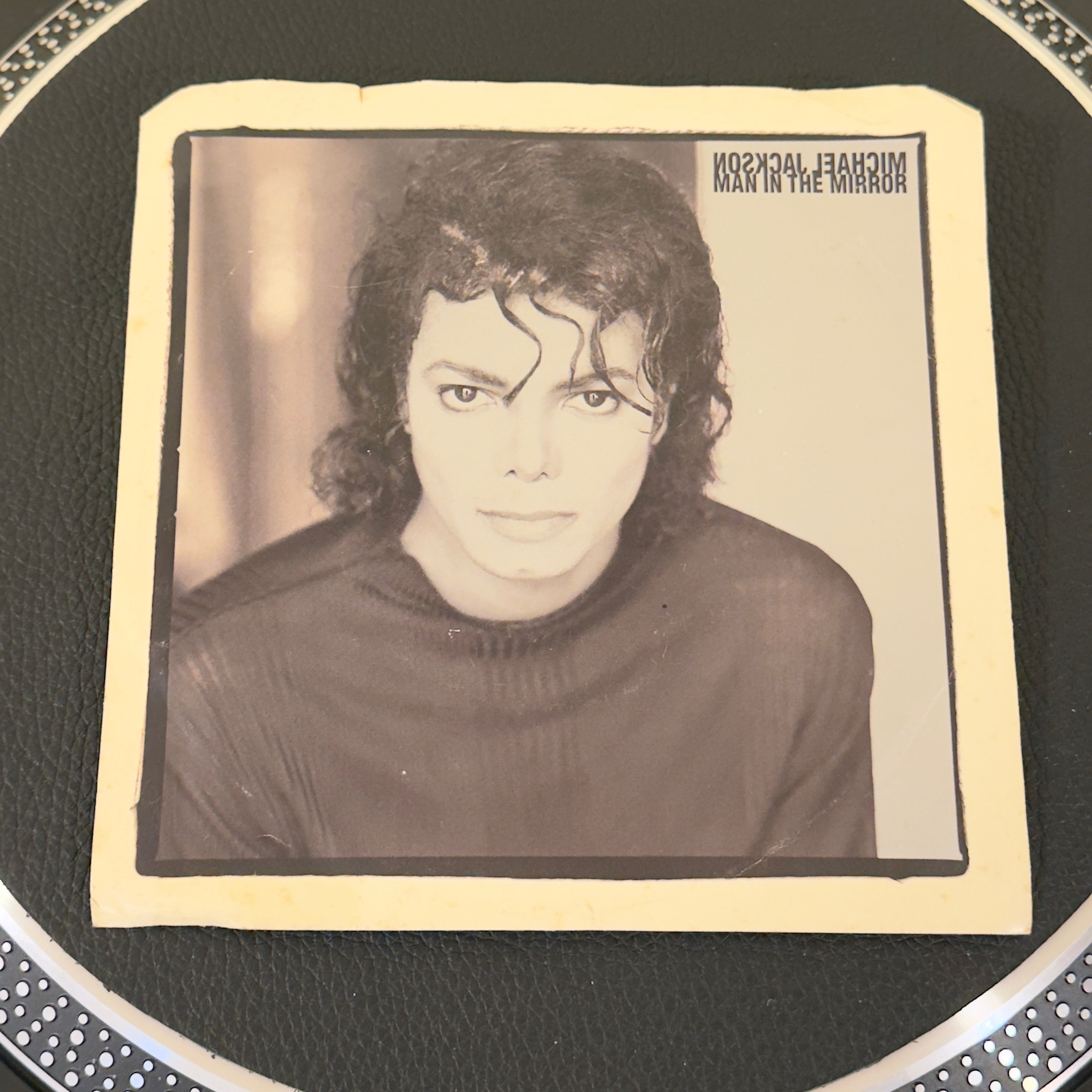 7" vinyl record by Michael Jackson featuring "Man In The Mirror/Man In The Mirror", released on Epic (34-07668), in VG+ (Very Good Plus) condition, classic analog collectable for turntable playback. Pic Sleeve - Promo Copy.