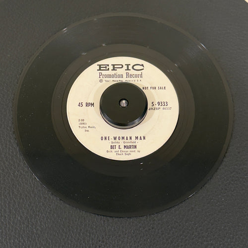 7" vinyl record by Bet E. Martin featuring "One-Woman Man/Maybe You'll Be There", released on Epic (5-9333), in VG (Very Good) condition, classic analog collectable for turntable playback. Vintage 1959 Rock Promo in generic white sleeve.
