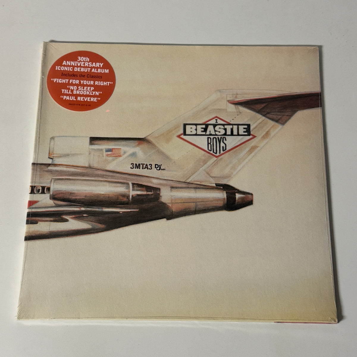 Beastie Boys LP - Licensed To Ill (30th Anniversary), released on Def Jam Recording (6025478207-5(4)), in M (Mint) condition, classic analog collectable for turntable playback. Sealed 2023 European Gatefold - 30th Anniversary reissue of one of hip-hop's most important albums.  Slight crease on cover.