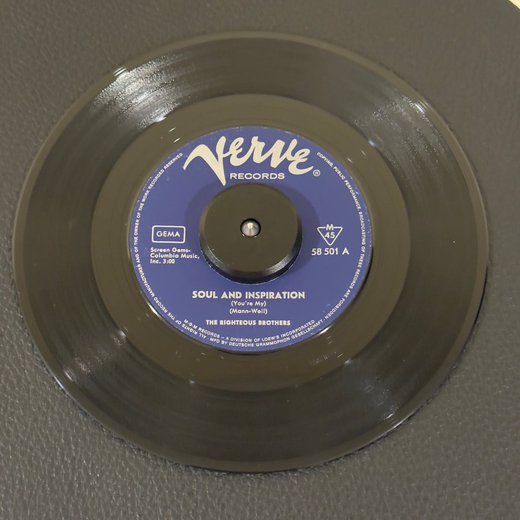 7" vinyl record by Righteous Brothers, The featuring "Soul and Inspiration/B Side Blues", released on Verve Records (58 501), in VG (Very Good) condition, classic analog collectable for turntable playback. Highly regarded German Pressing of the 1966 #1 hit!!  Does not include pic sleeve.