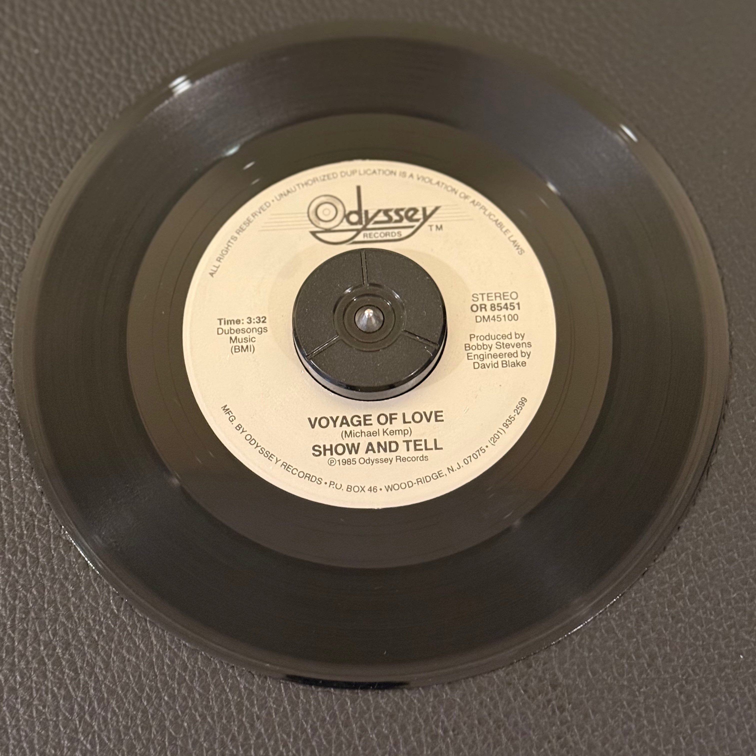 7" vinyl record by Show And Tell featuring "Voyage of Love/Do I Love You", released on Odyssey Records (OR 85451), in VG (Very Good) condition, classic analog collectable for turntable playback. Some swirl marks on side B brings it to a VG, otherwise would be VG+. Plays great!