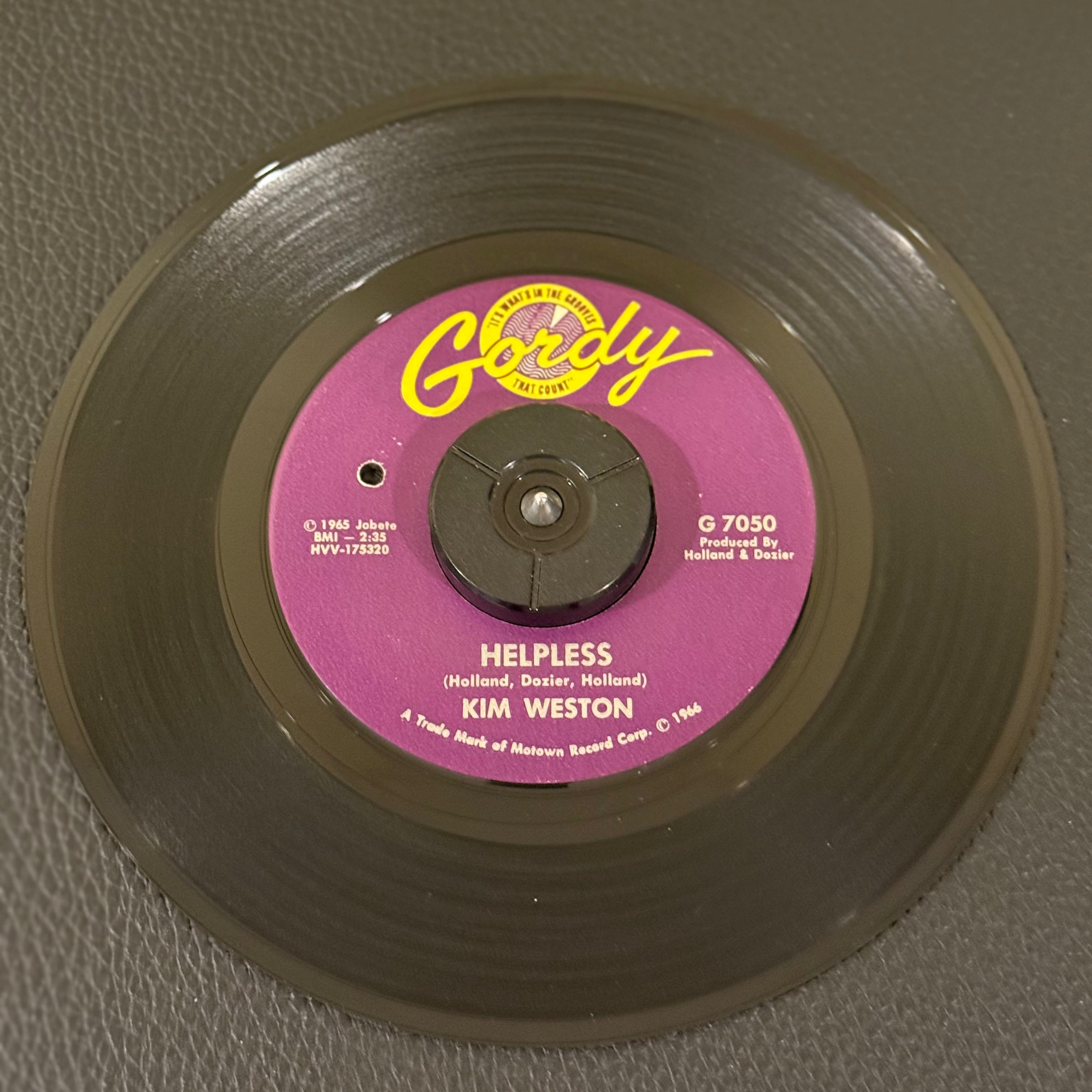 7" vinyl record by Kim Weston featuring "Helpless/A Love Like Yours", released on Gordy (G 7050), in VG+ (Very Good Plus) condition, classic analog collectable for turntable playback.